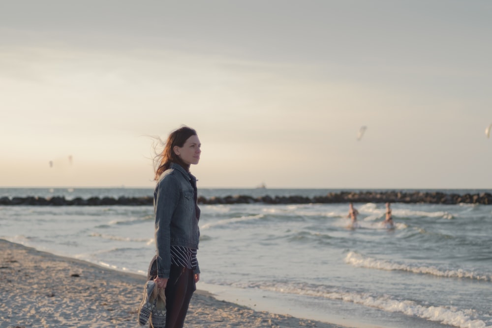 person standing on shoreline