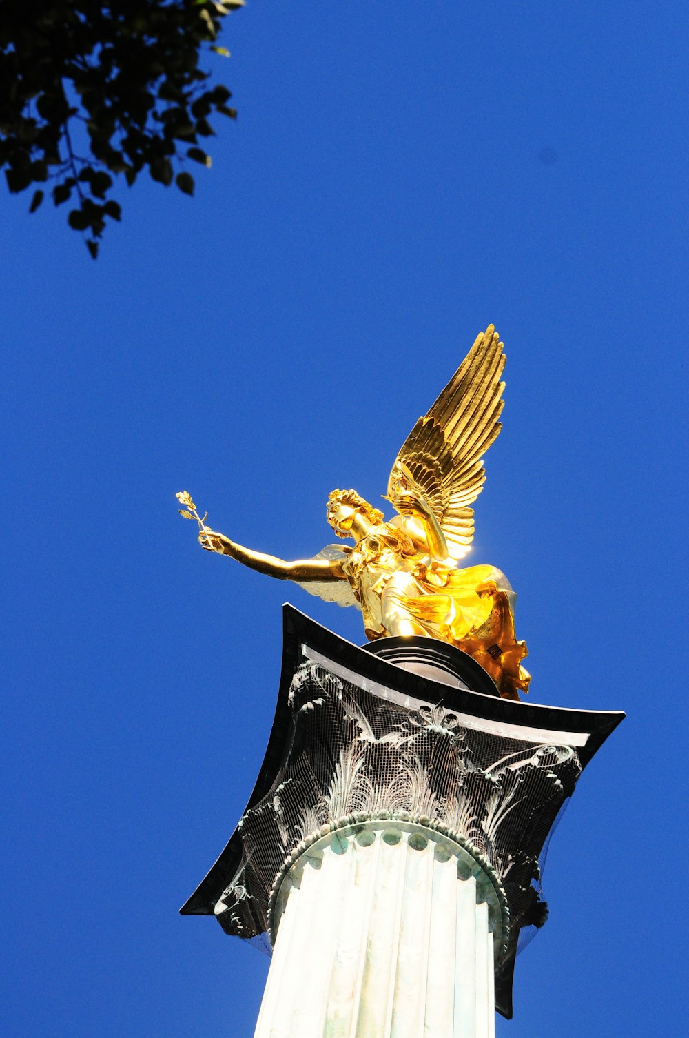 low angle photo of angel statue