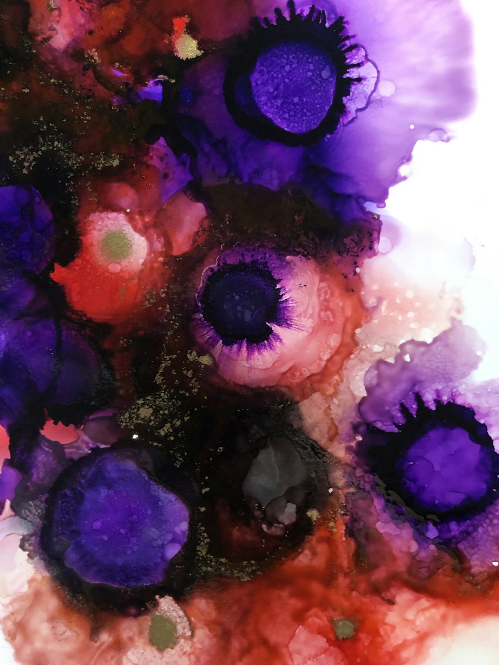 a painting of purple and red flowers on a white background