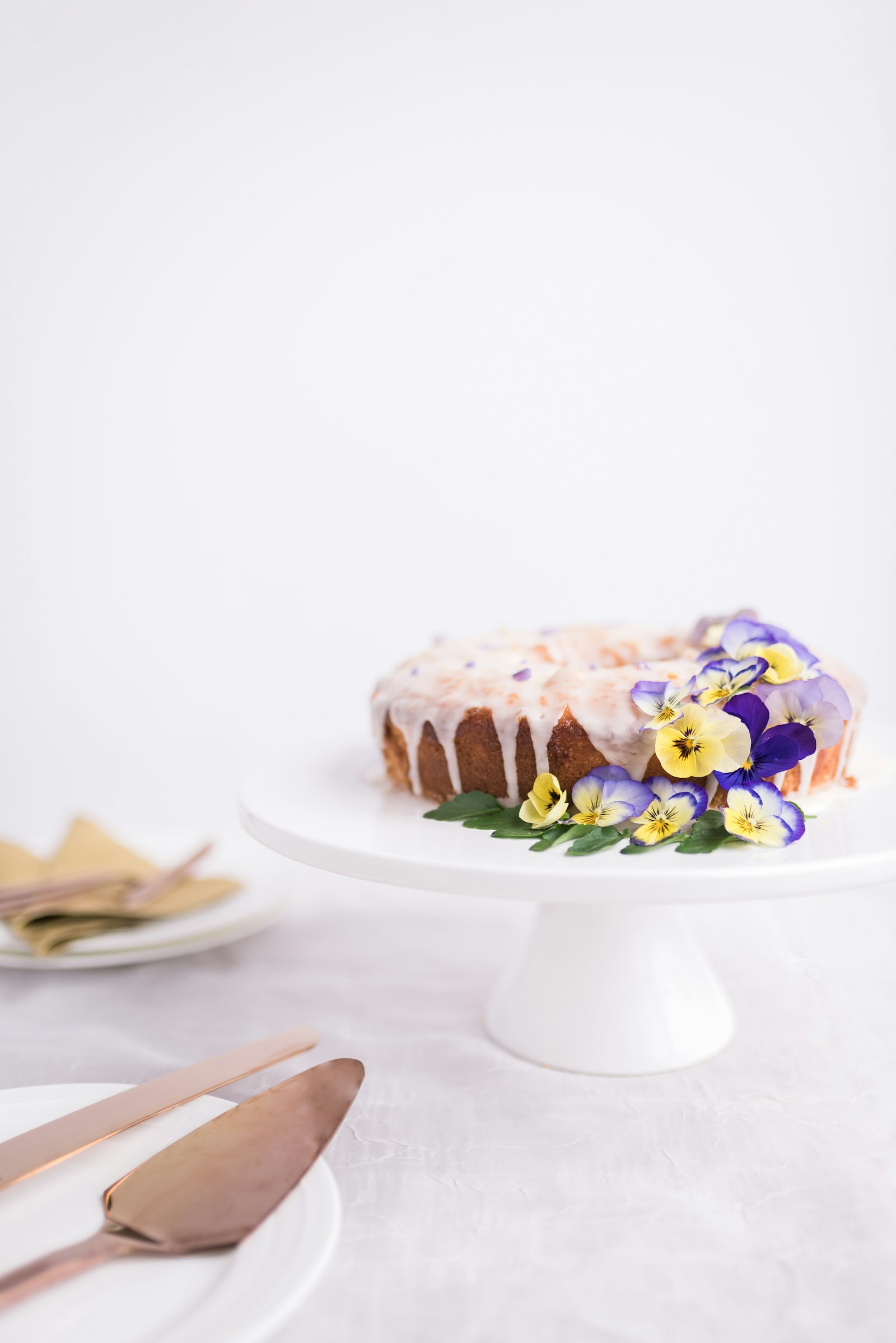 Sigma 35mm F1.4 DG HSM Art sample photo. Cake on ceramic footed photography