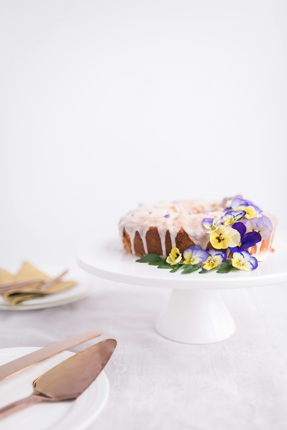 cake on ceramic footed plate