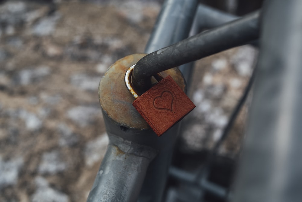 selective focus photography of brown padlock