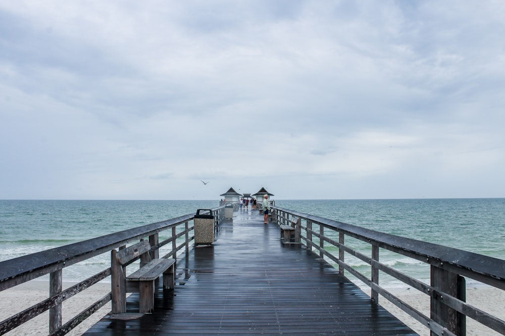 black wooden ocean dock photography