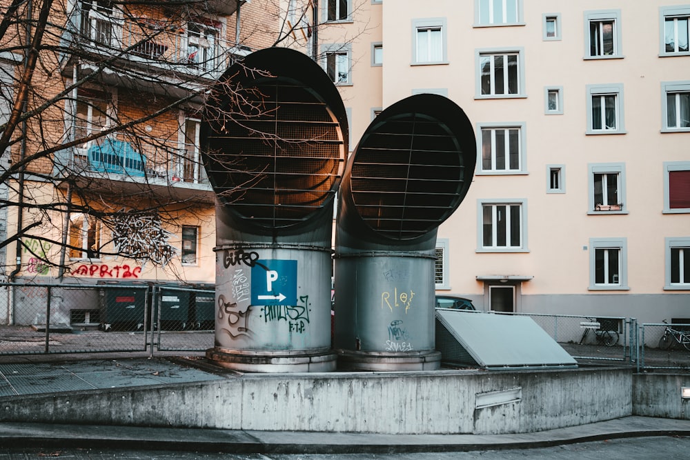 2 large metal exhaust chimney