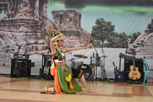 A lively cultural presentation featuring dancers and musicians celebrating Amazonian heritage on stage.