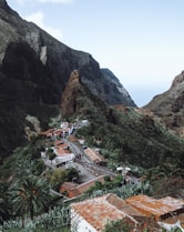 houses near mountain during daytime