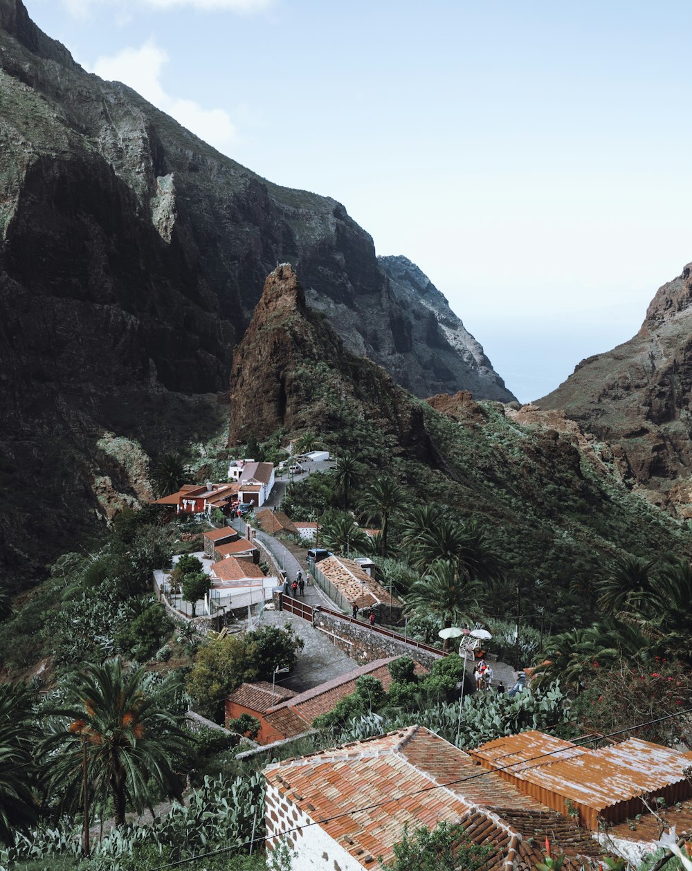 houses near mountain during daytime