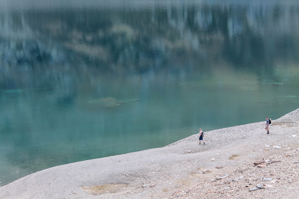 two people by the body of water