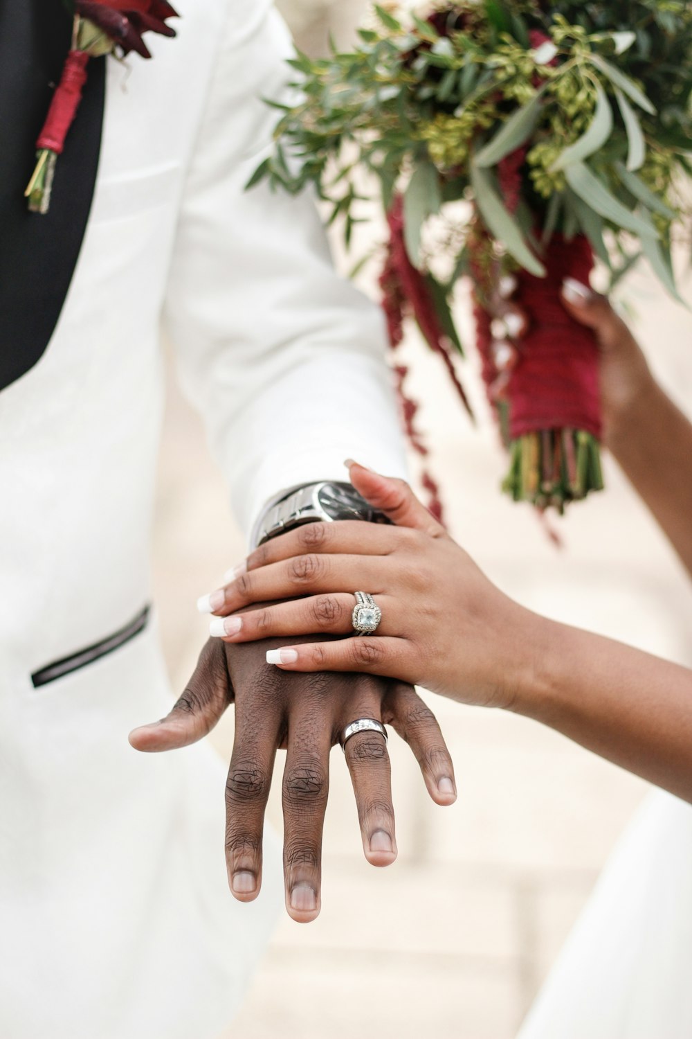 woman holding the man's hand