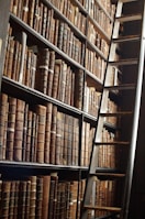 A bookshelf filled with law books and legal texts.