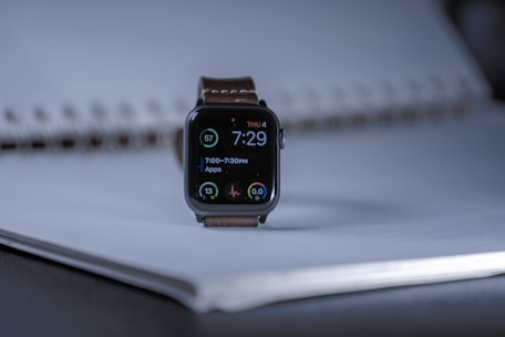 An AI-powered smartwatch glowing softly on a wrist during a morning jog.