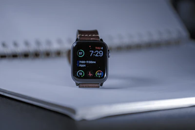 High-tech smartwatch showing notifications on a wrist in natural light