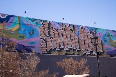 An inspiring mural depicting themes of mental health and wellness.