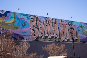 A vibrant mural depicting the importance of words in society.