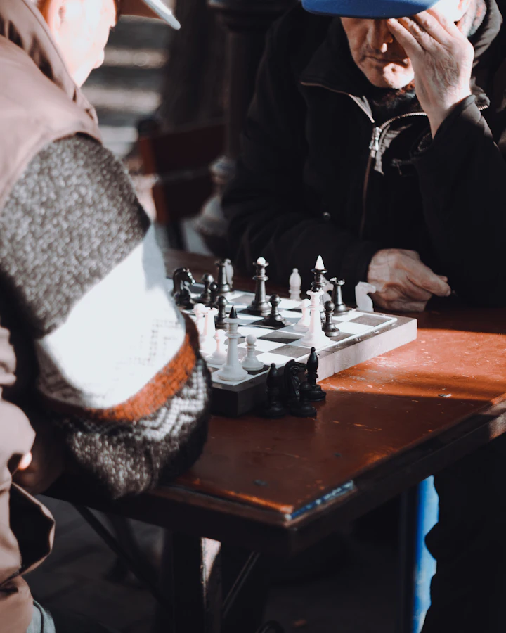 Two people playing chess