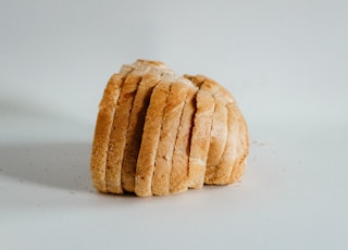 sliced of bread on top of white surface