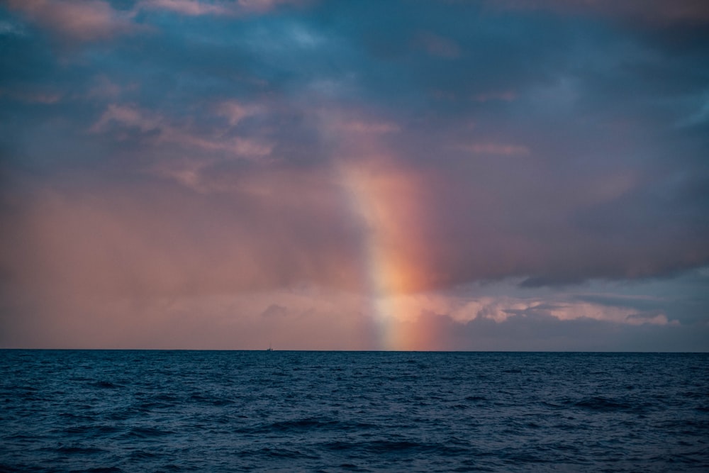 pink and blue sky over sea