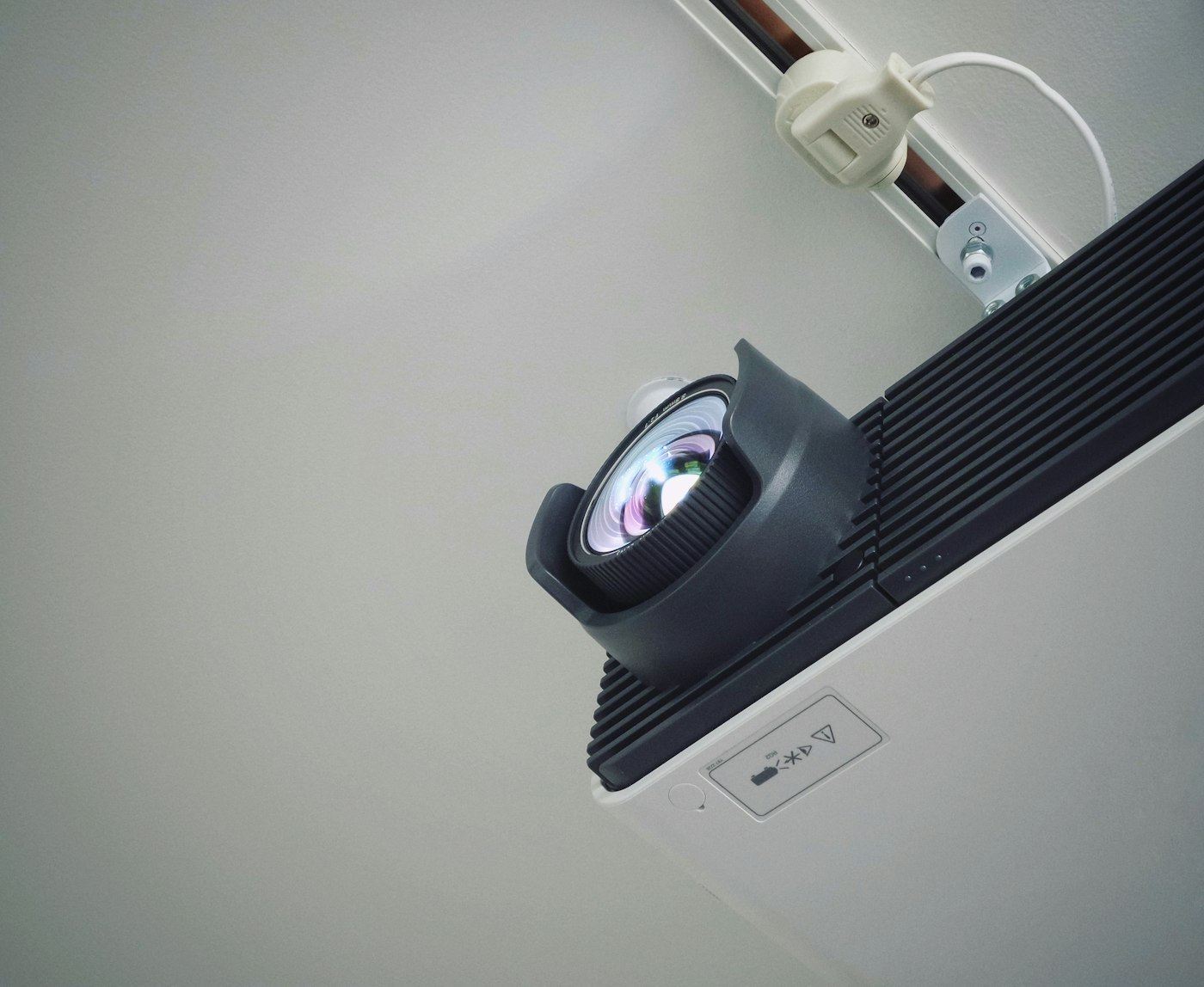 Ceiling-mounted projector used for slide presentations