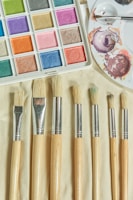 seven brushes and water color palette