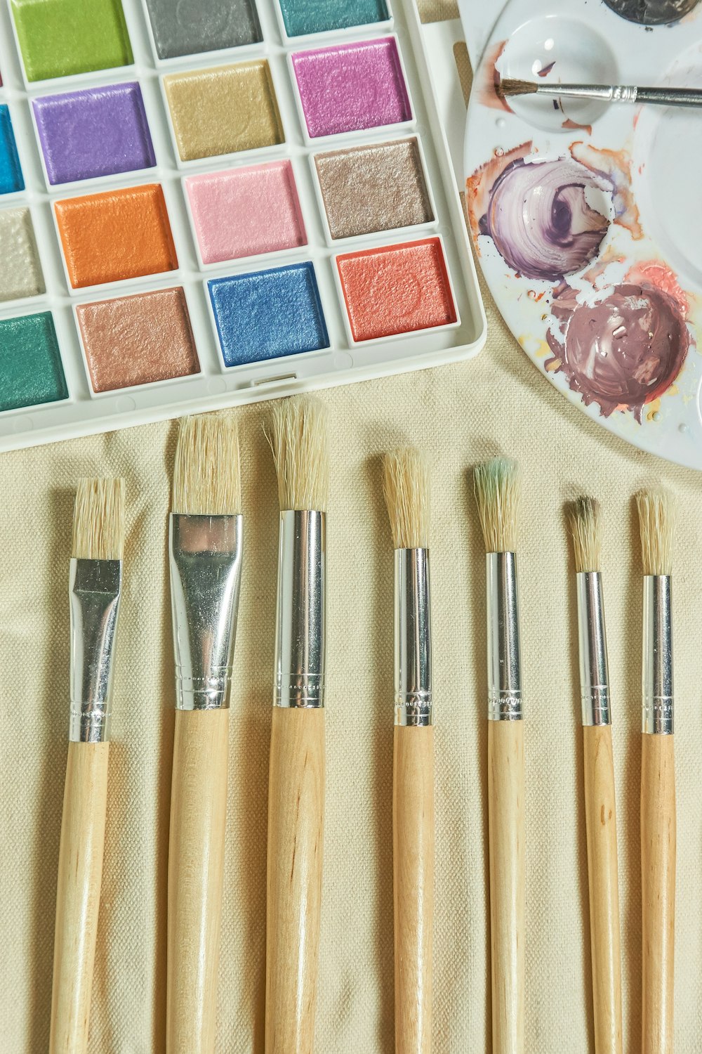 seven brushes and water color palette