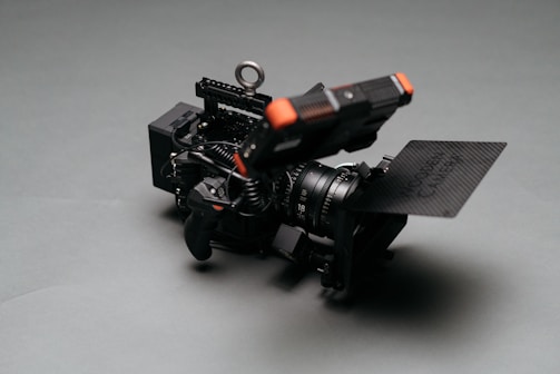 Close-up of a matte box mounted on a professional video camera lens.