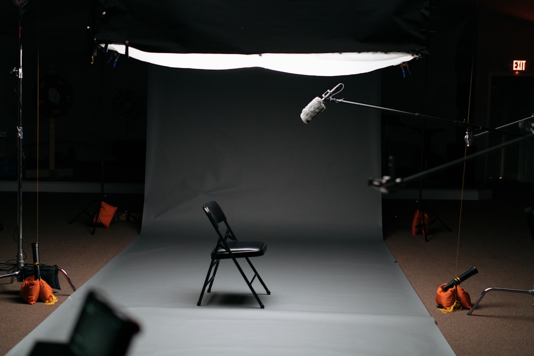 black folding chair on canvas,