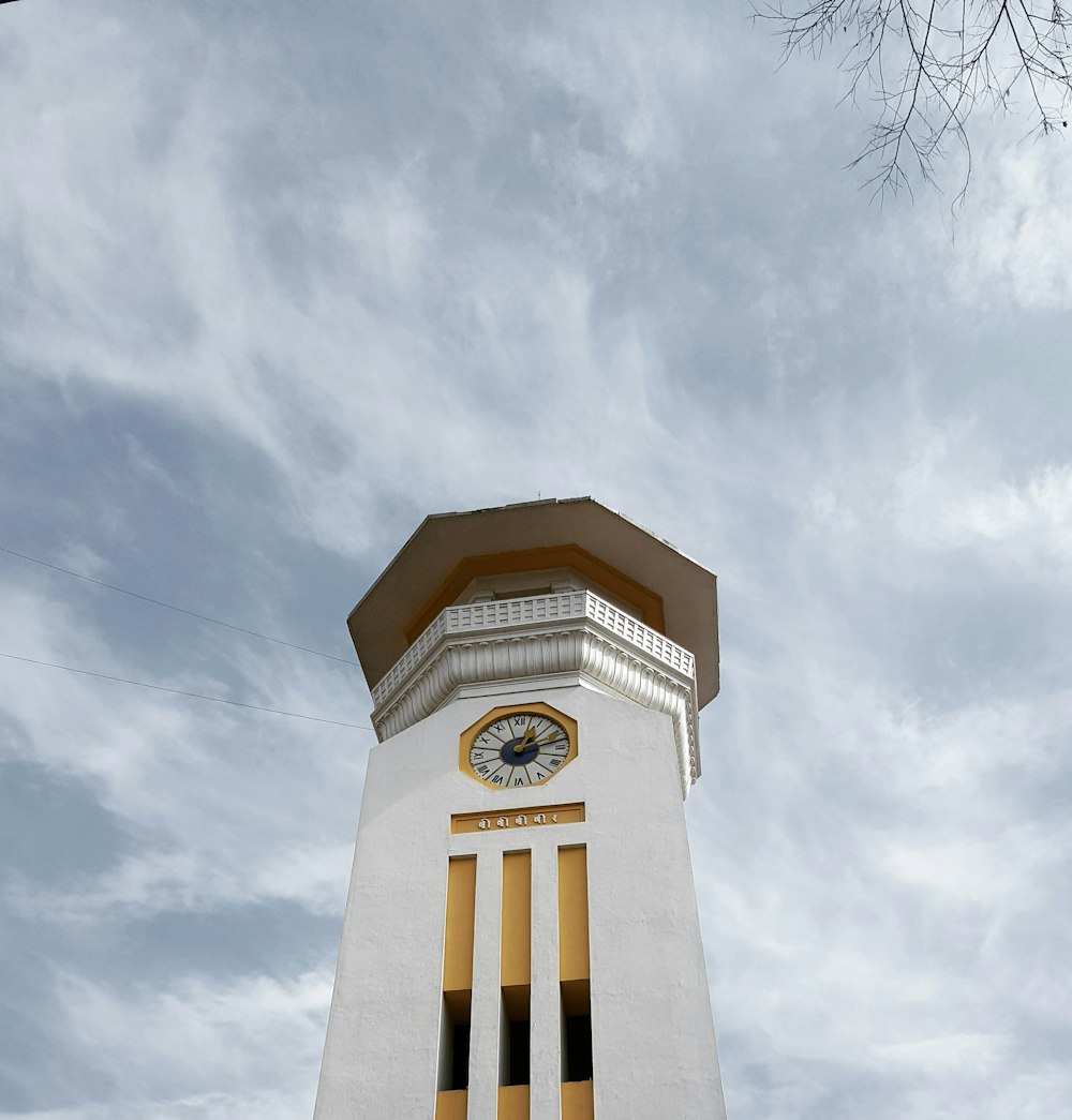 white concrete tower under white sky