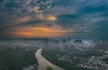 aerial view of body of water near trees