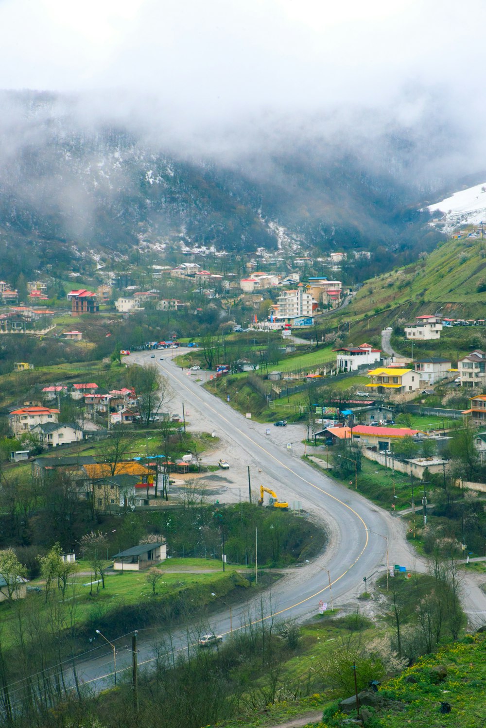 high angle photography of town with smoky sky