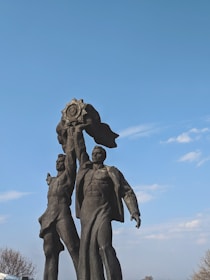 Artistic shot of intertwined Thor and his wife figures made of light representing harmony and health.