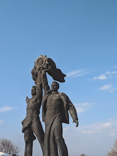 Artistic shot of intertwined Thor and his wife figures made of light representing harmony and health.