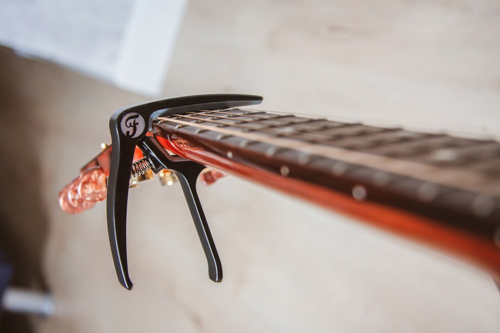 close view of guitar neck with clip