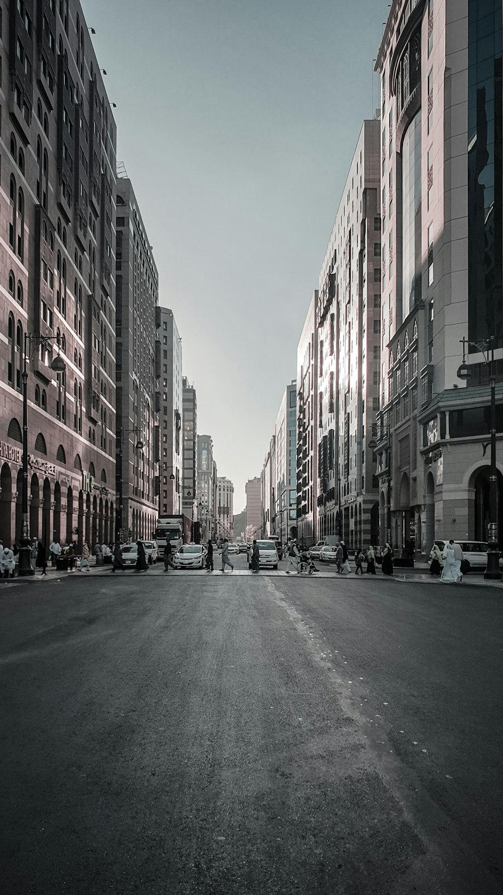 people crossing road during daytime