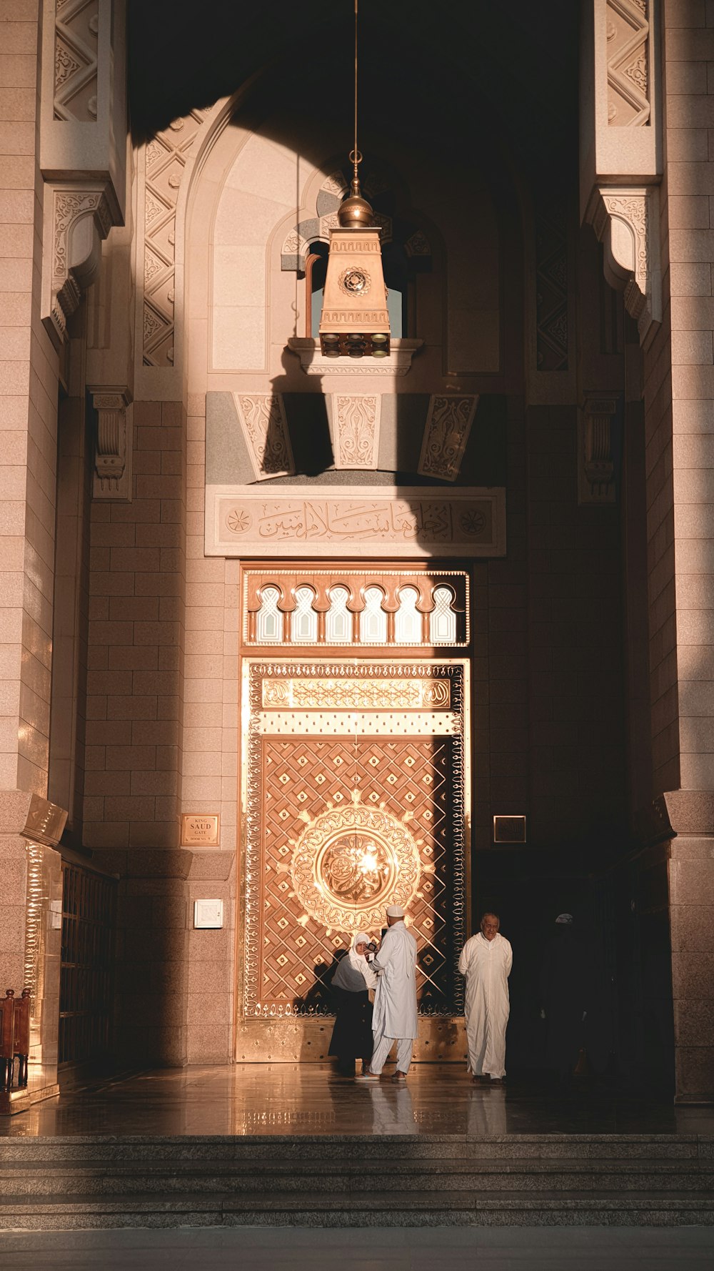 2 person standing inside the building