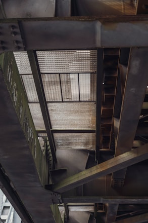 A close-up of green steel being produced in a modern industrial facility.