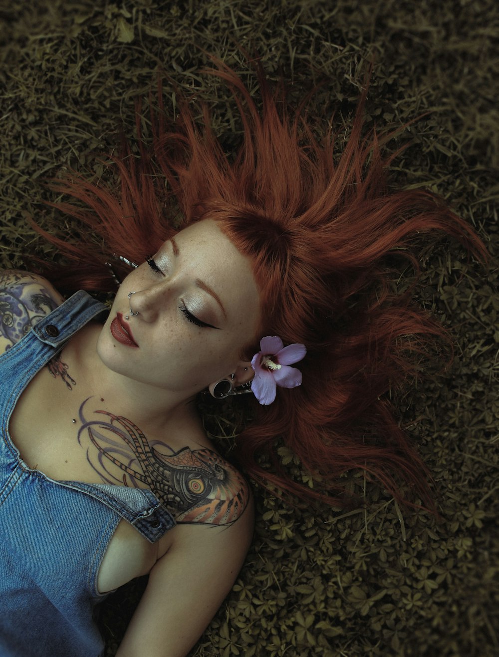 woman lying on grass