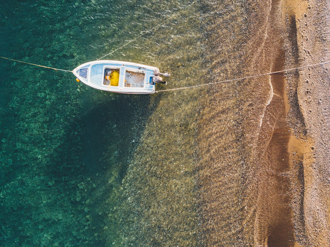 aerial view photography of boat on shore