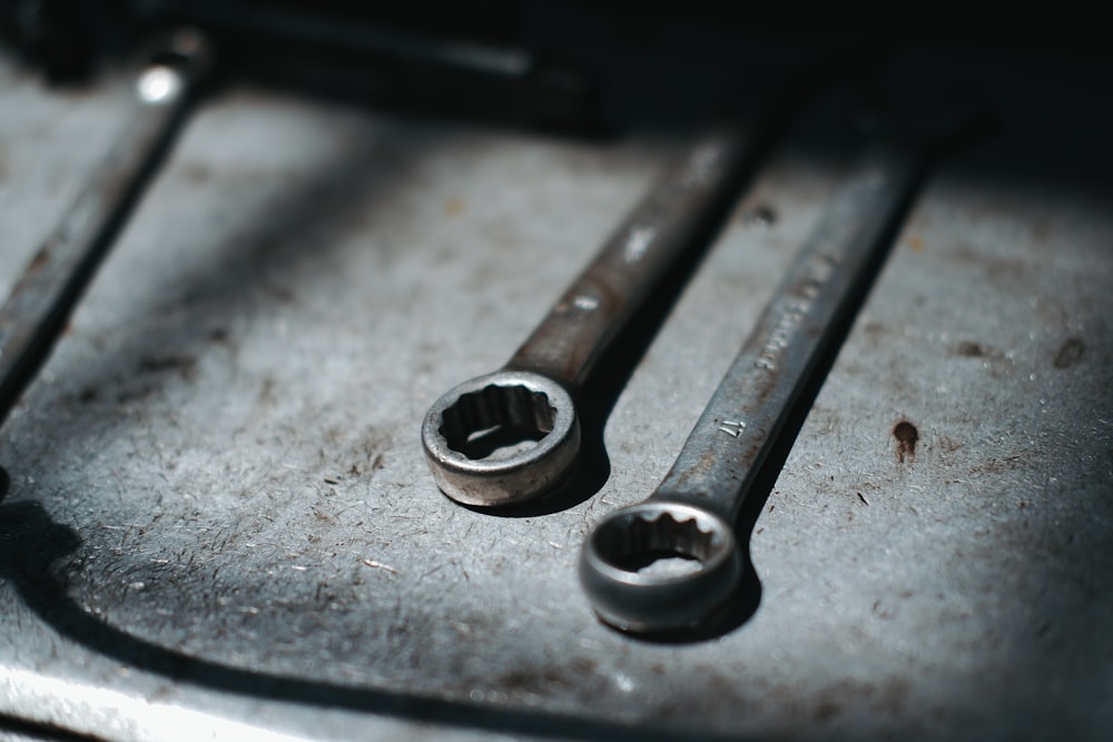 two gray close wrench