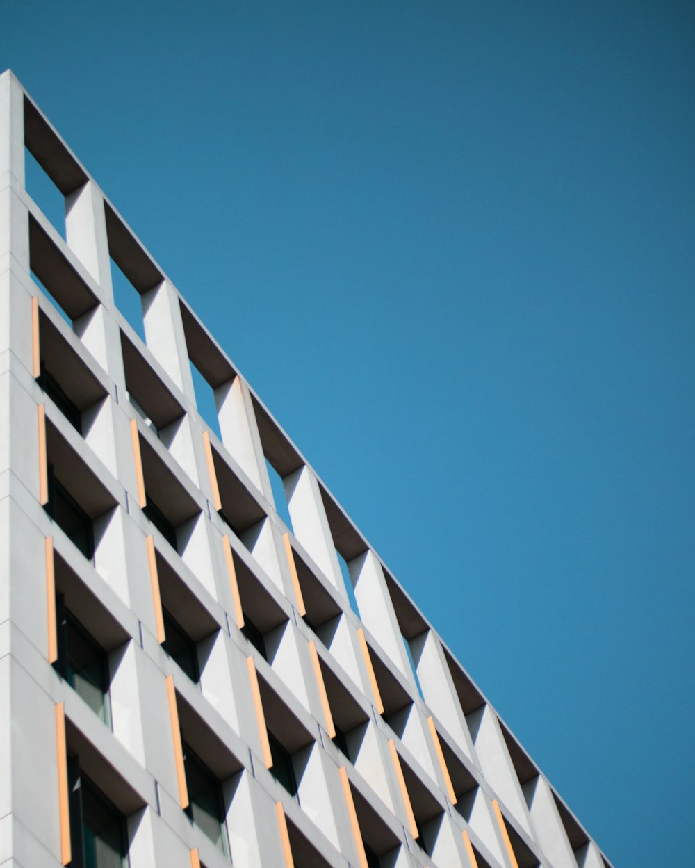 a close up of a building with a blue sky in the background