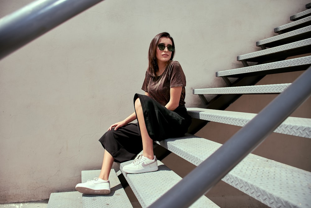 woman sitting on stairs