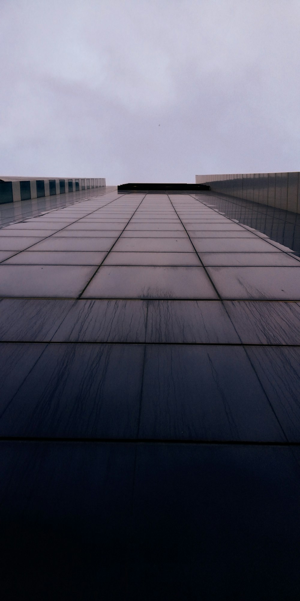 low angle photography of curtain wall building