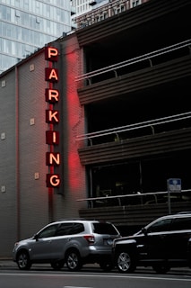 gray SUV parked in road during daytime