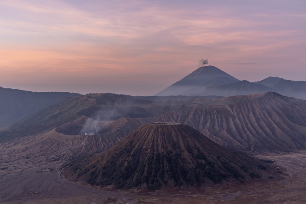 landscape of mountains and volcano