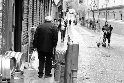 Delivery truck transporting fresh beer kegs on an urban street with industrial aesthetic