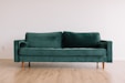 green fabric sofa