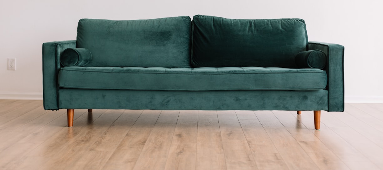 green fabric sofa
