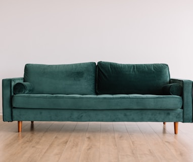 green fabric sofa
