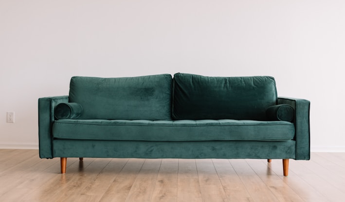 green fabric sofa