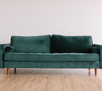 green fabric sofa