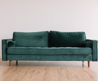 green fabric sofa